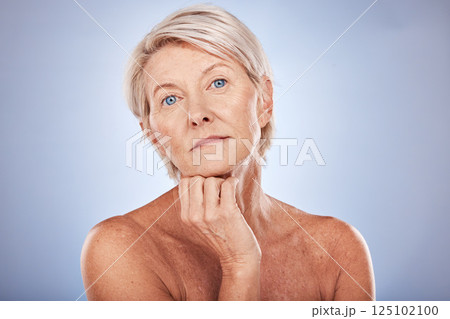 Senior woman, skincare and beauty with face portrait, wellness and health against grey mockup studio background. Cosmetic and dermatology of elderly person facial makeup with anti aging treatment 125102100