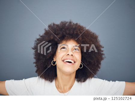 Happy, hope and worship of black woman prayer for wellness, gratitude and faith with joyful smile. Happiness, peace and spiritual lifestyle of religious girl praying with gray studio mockup. 125102724