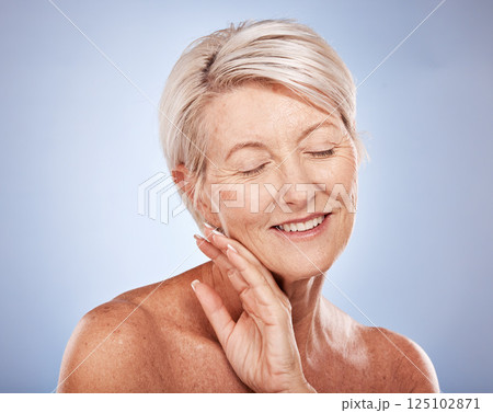 Beauty, skincare and mature woman for happy, health and wellness with smile on a grey studio background. Anti aging, senior female and fresh, glowing and healthy skin care and body care Beauty, skincare and mature woman for happy, health and wellness with smile on a grey studio background. Anti aging, senior female and fresh, glowing and healthy skin care and body care 125102871