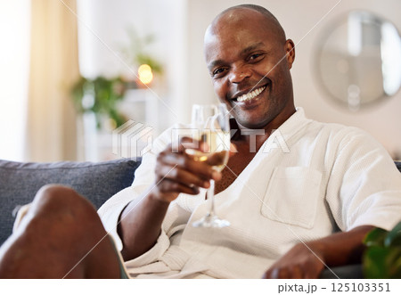 Champagne, spa and black man portrait toast to skincare, self care and wellness at a luxury resort. Happy, zen and smile of a man customer with a wine glass and alcohol ready for a massage or facial Champagne, spa and black man portrait toast to skincare, self care and wellness at a luxury resort. Happy, zen and smile of a man customer with a wine glass and alcohol ready for a massage or facial 125103351