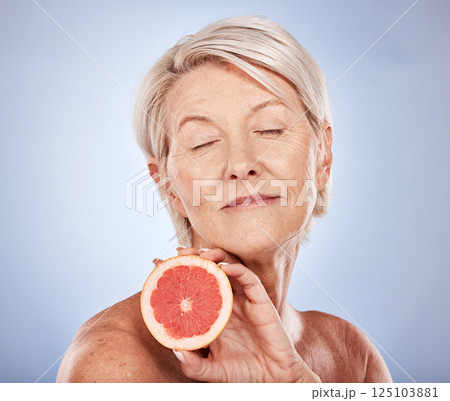 Mature woman, fruit and skincare, beauty and health for vitamin c anti aging, fresh skin care and body care on a grey studio background. Citrus, grapefruit and antioxidants for organic treatment Mature woman, fruit and skincare, beauty and health for vitamin c anti aging, fresh skin care and body care on a grey studio background. Citrus, grapefruit and antioxidants for organic treatment 125103881