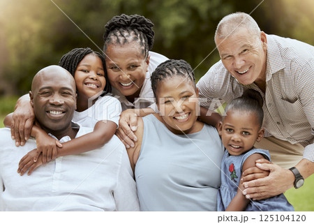 Big family, smile and portrait at park on vacation, holiday or summer trip. Love, black family and grandparents, kids and mother, father and interracial couple enjoying quality time together outdoors 125104120