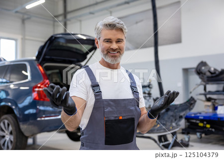 Worker in automotive industry doing diagnostics on transport vehicle Worker in automotive industry doing diagnostics on transport vehicle 125104379