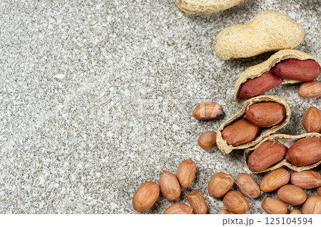 Shelled and Unshelled Peanuts Close-Up Space For Text Shelled and Unshelled Peanuts Close-Up Space For Text 125104594