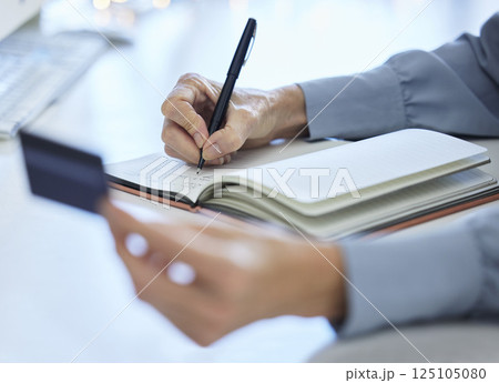 Hand, writing and credit card with woman planning financial budget in notebook for investment and savings. Finance, accounting and debit card for budgeting on paper or document for accounting Hand, writing and credit card with woman planning financial budget in notebook for investment and savings. Finance, accounting and debit card for budgeting on paper or document for accounting 125105080