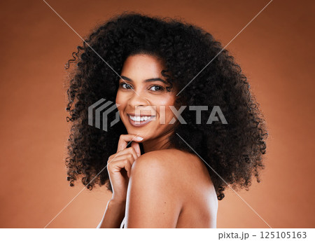 Black woman, skincare and cosmetic beauty with natural hair wellness or healthcare. African girl, portrait and luxury spa or self love motivation with self care happiness in brown studio background Black woman, skincare and cosmetic beauty with natural hair wellness or healthcare. African girl, portrait and luxury spa or self love motivation with self care happiness in brown studio background 125105163