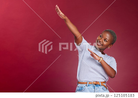 Dance, marketing and happy black woman in studio with a red background in celebration of a sale or discount. Success, winner and excited African girl dancing with pride with advertising mockup space Dance, marketing and happy black woman in studio with a red background in celebration of a sale or discount. Success, winner and excited African girl dancing with pride with advertising mockup space 125105183