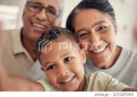 Selfie, smile and boy with grandparents for a portrait, happy and relax in family home together. Love, care and child with a senior man and woman for a photo, bonding and happiness as a happy family 125105303