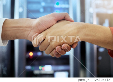 Handshake, partnership and teamwork of server room of data center workers shaking hands for achievement, b2b deal and agreement. Man in woman together in collaboration for network, IT and support Handshake, partnership and teamwork of server room of data center workers shaking hands for achievement, b2b deal and agreement. Man in woman together in collaboration for network, IT and support 125105412