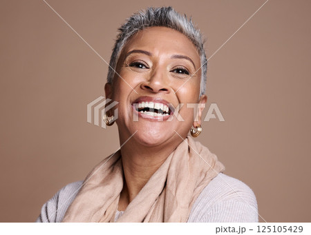 Smile, happy and senior woman excited for skincare beauty wellness in studio. Elderly person, cosmetics makeup and anti aging botox treatment for healthy skin lifestyle against brown background 125105429
