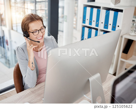 Call center, customer service and consultant with a business woman at work on a computer in her office. Contact us, crm and telemarketing with a female consulting using a headset for sales or support Call center, customer service and consultant with a business woman at work on a computer in her office. Contact us, crm and telemarketing with a female consulting using a headset for sales or support 125105622