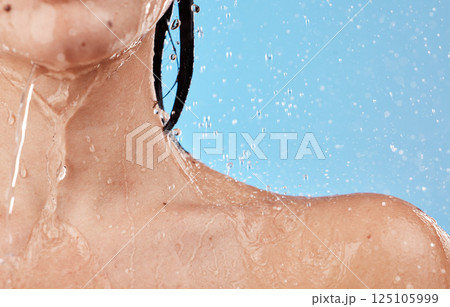 water, shower and woman shoulder closeup for skincare wellness cleaning or healthy morning routine for beauty. Under water, cosmetics treatment and young person washing in blue background studio water, shower and woman shoulder closeup for skincare wellness cleaning or healthy morning routine for beauty. Under water, cosmetics treatment and young person washing in blue background studio 125105999