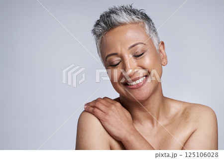 Skincare, face and senior woman with eyes closed in studio on a gray background mockup. Makeup, aesthetics and cosmetics of mature female model feeling happy for glowing and healthy skin mock up. 125106028