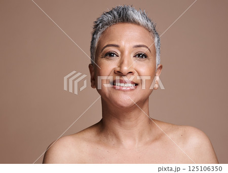 Portrait, cosmetics and senior woman face for skincare, wellness and natural beauty for health against studio background. Makeup, mature lady and elderly female with smile, confident and smooth skin. Portrait, cosmetics and senior woman face for skincare, wellness and natural beauty for health against studio background. Makeup, mature lady and elderly female with smile, confident and smooth skin. 125106350