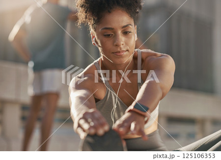 Music, headphones and black woman stretching for fitness warm up, cardio exercise and training for marathon race. Workout, health commitment and runner listening to radio or streaming audio podcast Music, headphones and black woman stretching for fitness warm up, cardio exercise and training for marathon race. Workout, health commitment and runner listening to radio or streaming audio podcast 125106353