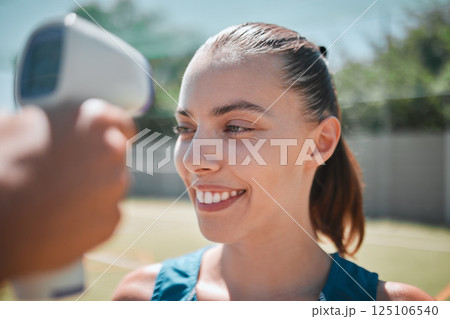 Sports woman check forehead with thermometer, fever test and covid 19 health safety risk on outdoor court. Active, fitness and young female, corona virus compliance and symptoms on infrared laser gun 125106540