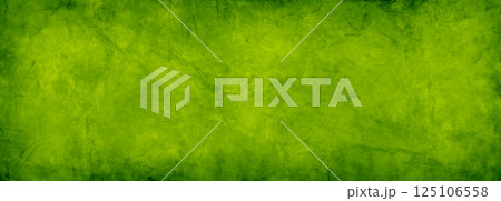 Green yellow grunge textured paper or wall background Abstract rough art texture with bright center and dark borders Horizontal panoramic banner header image backdrop wallpaper design with copy space Green yellow grunge textured paper or wall background Abstract rough art texture with bright center and dark borders Horizontal panoramic banner header image backdrop wallpaper design with copy space 125106558