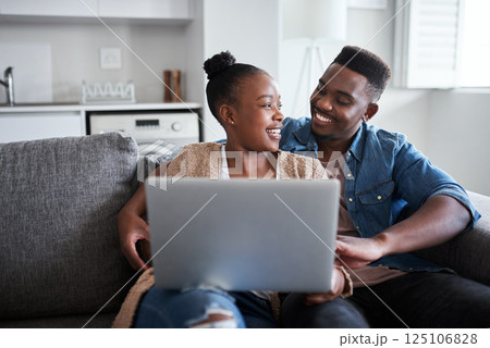 Laptop, sofa and black couple relax while doing online web or internet search for romantic movie, show or subscription video. Love, bonding and marriage partnership of man and woman on cute home date 125106828