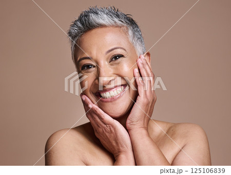 Happy senior woman, studio portrait and beauty with skincare, cosmetics and smile for glow, shine or skin. Model, face and makeup for anti aging facial, skin and self care by cosmetics background Happy senior woman, studio portrait and beauty with skincare, cosmetics and smile for glow, shine or skin. Model, face and makeup for anti aging facial, skin and self care by cosmetics background 125106839