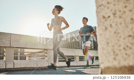 Fitness, couple and running workout in city, urban town and sunshine for exercise, healthy lifestyle and wellness. Young man, woman and runner partner with motivation of cardio, marathon and training 125106936
