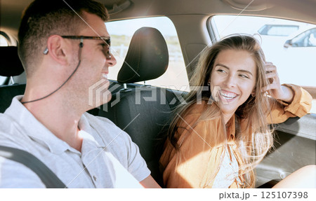 Road trip, couple and smile in car travel together in traffic for driving, transport or urban adventure in city. Man, woman and happy driver on road, street or journey with happiness on vacation Road trip, couple and smile in car travel together in traffic for driving, transport or urban adventure in city. Man, woman and happy driver on road, street or journey with happiness on vacation 125107398