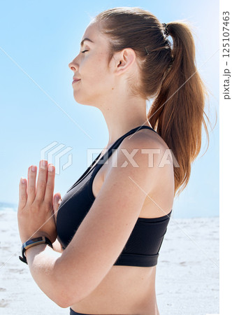 Relax, yoga and meditation, woman at beach, meditate and training in nature for healthy zen lifestyle. Mental health, spiritual wellness and meditating girl at ocean, balance and focus at sea water. 125107463