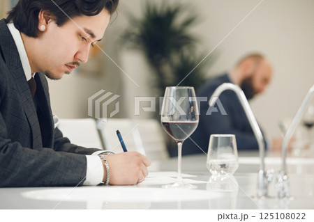 Aspiring Sommelier in Wine Assessment Class. Wine tasting training, wineries and winemaking lecture. Professional development courses. Aspiring Sommelier in Wine Assessment Class. Wine tasting training, wineries and winemaking lecture. Professional development courses. 125108022