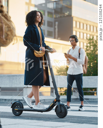 Scooter, city and business woman going to work with an electric vehicle on an outdoor street in Mexico. Travel, happy and professional female corporate manager commuting to the office in urban town. Scooter, city and business woman going to work with an electric vehicle on an outdoor street in Mexico. Travel, happy and professional female corporate manager commuting to the office in urban town. 125108244