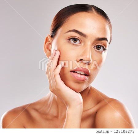 Portrait, woman and skincare for cosmetics, natural beauty or confident for health, wellness or pride against grey studio background. Makeup, female or girl with pride, organic facial and smooth skin Portrait, woman and skincare for cosmetics, natural beauty or confident for health, wellness or pride against grey studio background. Makeup, female or girl with pride, organic facial and smooth skin 125108275