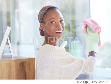 Cleaning service, window glass and black woman with cloth for office, apartment or wealth home spring cleaning work. Happy woman cleaner with housework and hygiene bacteria solution for dust or dirt Cleaning service, window glass and black woman with cloth for office, apartment or wealth home spring cleaning work. Happy woman cleaner with housework and hygiene bacteria solution for dust or dirt 125108482