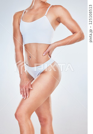 Healthy body goals, woman in studio with white background mockup or fitness motivation for self love. Model girl with clean wellness diet, confident underwear pose in studio or strong body positivity 125108513