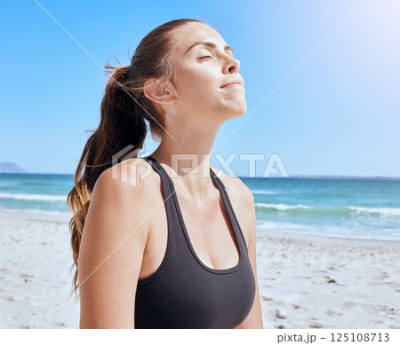 Meditation, relax and woman with peace at beach, breathing and doing yoga for freedom. Health, wellness and calm girl training her mind with a spiritual exercise for faith in the morning by the sea Meditation, relax and woman with peace at beach, breathing and doing yoga for freedom. Health, wellness and calm girl training her mind with a spiritual exercise for faith in the morning by the sea 125108713