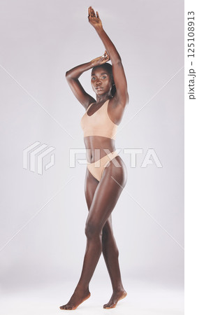 Beauty, black woman and skincare in studio for skincare, skin and body wellness against a white background mockup. Portrait, lingerie and model girl proud after weight loss, health and body positive Beauty, black woman and skincare in studio for skincare, skin and body wellness against a white background mockup. Portrait, lingerie and model girl proud after weight loss, health and body positive 125108913