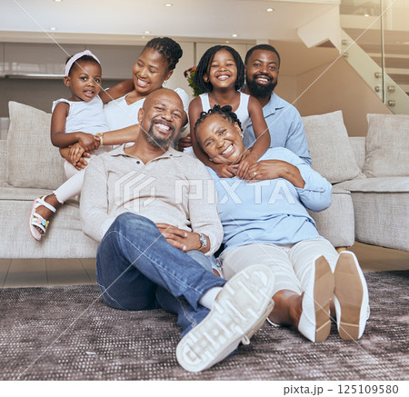 Portrait, big family and african american people bonding with love, care and affection in a family home. Generations, grandmother and grandfather with children and parents at home while relaxing Portrait, big family and african american people bonding with love, care and affection in a family home. Generations, grandmother and grandfather with children and parents at home while relaxing 125109580