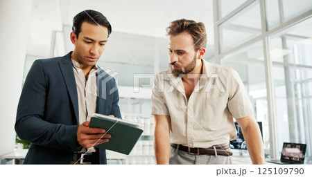 Men, tablet and discussion in office for project, partnership or review at biohacking startup. Engineer, consulting and digital touchscreen for brain scan, app or research at neurotechnology company 125109790