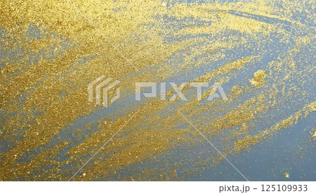 ゴールドのきらめきが舞う華やかなグリッターテクスチャ背景 ゴールドのきらめきが舞う華やかなグリッターテクスチャ背景 125109933