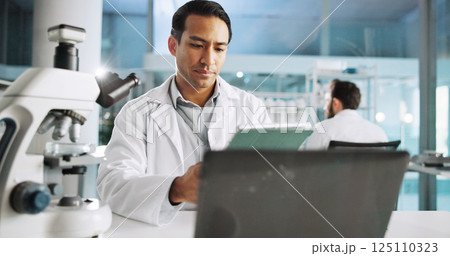 Tablet, science and research with man in laboratory for DNA sample, forensics investigation and healthcare. Laptop report, genetic analysis and medical test with person for pathology and clinic Tablet, science and research with man in laboratory for DNA sample, forensics investigation and healthcare. Laptop report, genetic analysis and medical test with person for pathology and clinic 125110323