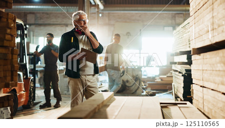 Carpenter, notes and thinking of wood in workshop for timber inspection, quality control and stock checklist. Manufacturing industry, mature man and clipboard for inventory management or supply chain 125110565
