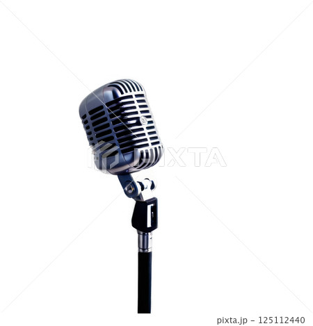Vintage-style microphone on a stand against a plain background ready for a live performance Vintage-style microphone on a stand against a plain background ready for a live performance 125112440
