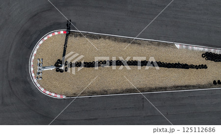 Top view curve asphalt race track, Race track with curve from drone, Race asphalt track and curve circuit asphalt race track. Top view curve asphalt race track, Race track with curve from drone, Race asphalt track and curve circuit asphalt race track. 125112686