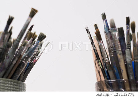 Brushes and spatulas on a white background. The tools of an artist or a sculptor for drawing. Creative professions, master classes. High quality photo 125112779