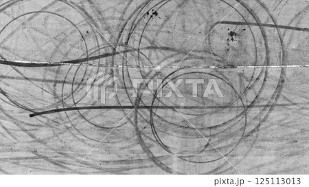Car tire mark from car skid mark, Car tire on asphalt road race track, Texture and background car wheel tire mark on asphalt road. 125113013