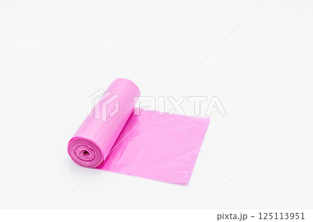 Roll of pink plastic garbage bags on white background, Pink color garbage bags roll, Roll of pink plastic garbage bags on white background. Roll of pink plastic garbage bags on white background, Pink color garbage bags roll, Roll of pink plastic garbage bags on white background. 125113951