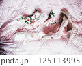 White stylish wedding shoes for bride. Close-up White stylish wedding shoes for bride. Close-up 125113995