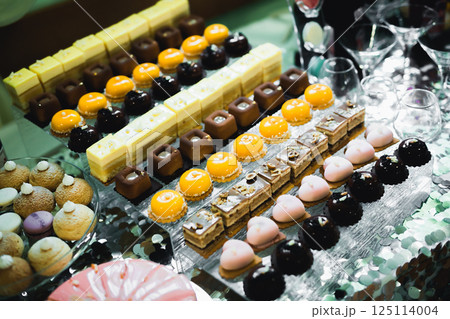 Buffet with a variety of delicious sweets, food ideas, celebration 125114004