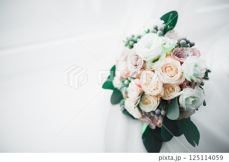 Wonderful luxury wedding bouquet of different flowers Wonderful luxury wedding bouquet of different flowers 125114059