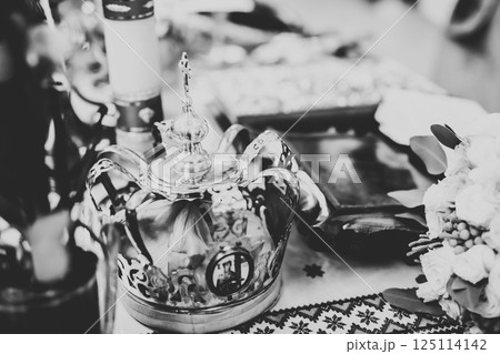 Golden crown lying on the table in church Golden crown lying on the table in church 125114142