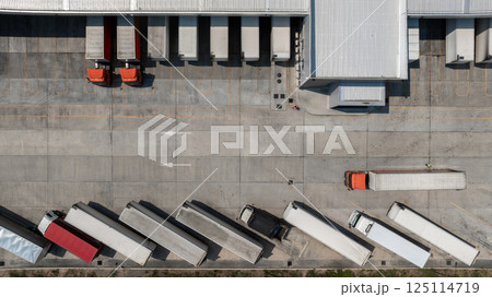 Top view semi truck with cargo trailer at logistic park warehouse load unload goods, Distribution warehouse shipping supply chain, Business transportation logistic freight shipping cargo by semi truck 125114719