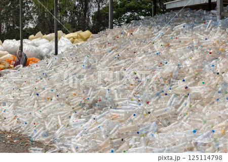 Plastic bottles waste texture and background, Plastic bottles waste, Background and texture of used empty PET bottles, Plastic water bottles pollution in environment, Global warming pollution, Save 125114798