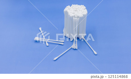 Cotton buds cotton swabs on blue background, Cotton bud swab clean health care on blue background, Cotton buds variety of uses for clean, Top view. 125114868
